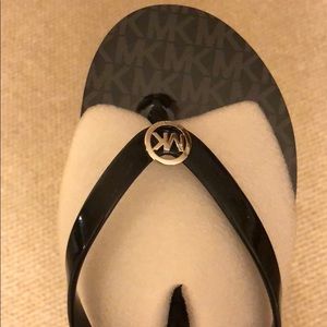 MK Jet Set flip flops